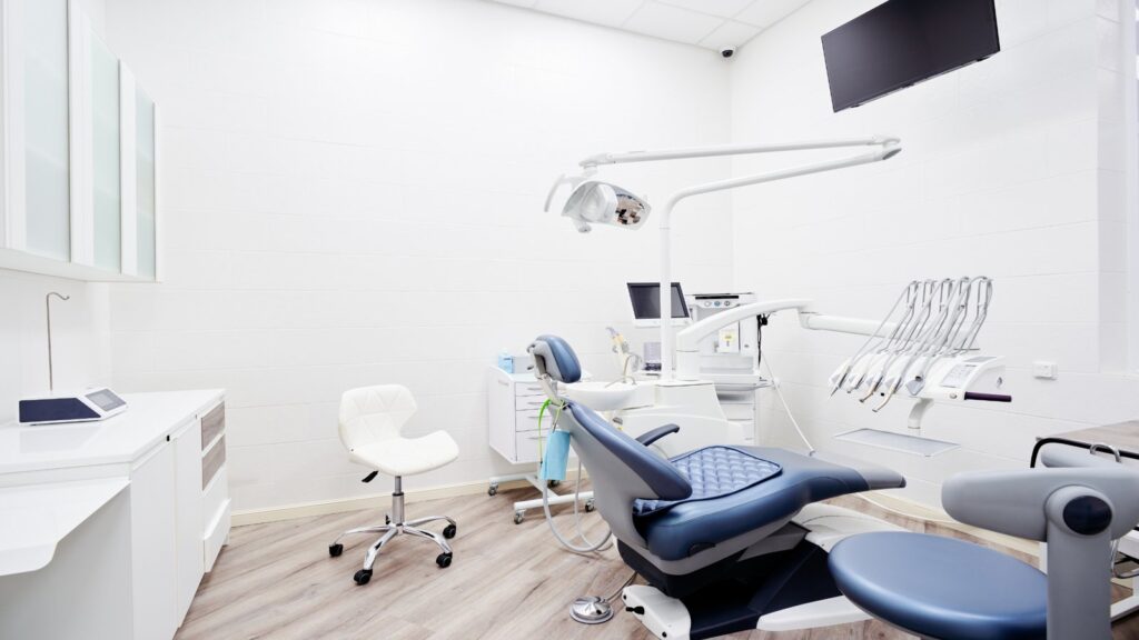 Modern dental exam room with ergonomic seating and clinical-grade cabinets, showing the importance of healthcare furniture in Canada for patient comfort and staff efficiency.