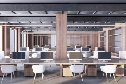 Modern open-concept coworking space featuring ergonomic desks, stylish chairs, and sleek storage — an example of high-quality office furniture Mississauga businesses use to enhance productivity and comfort.