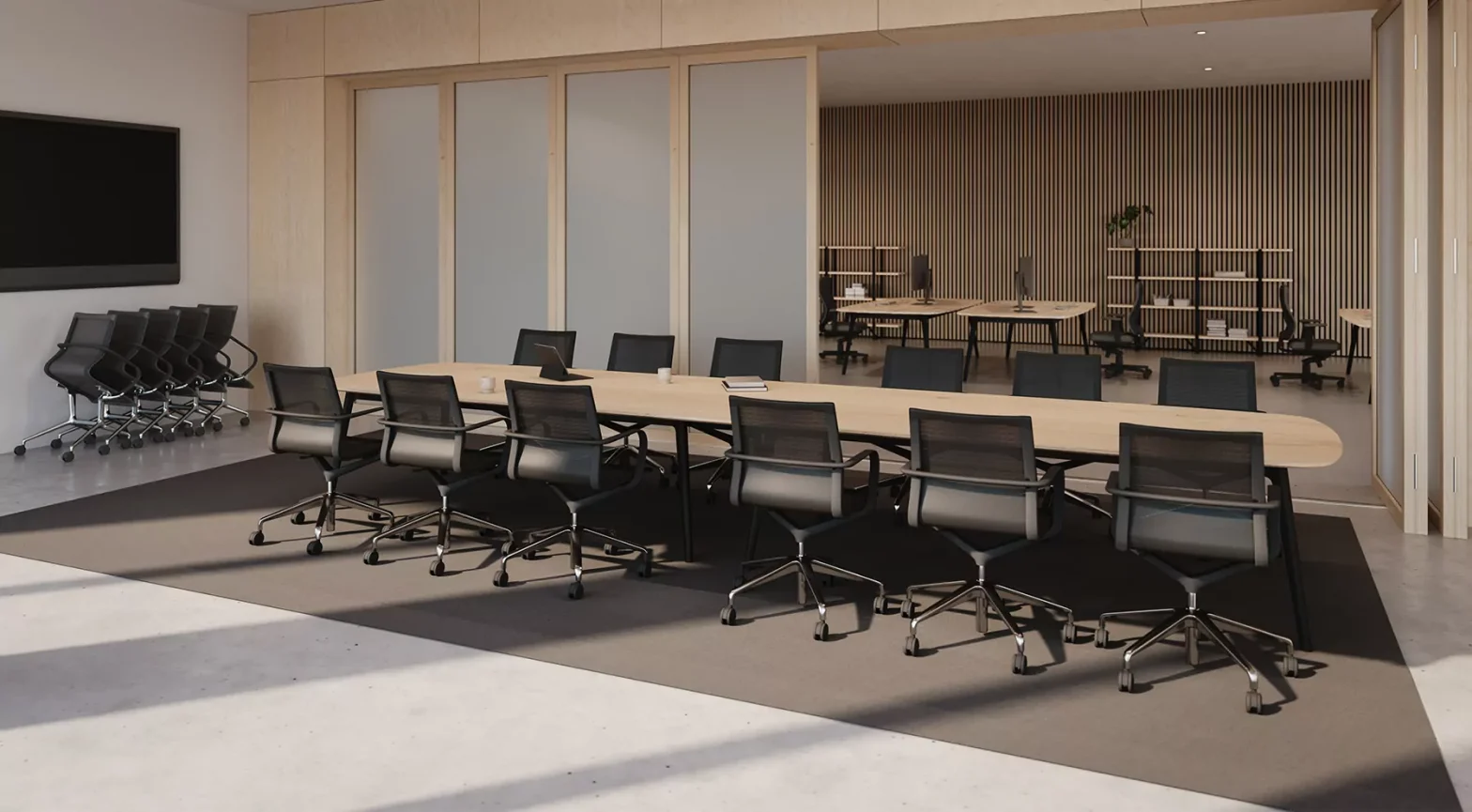 Modern boardroom with used office furniture Mississauga businesses trust, featuring a large conference table and ergonomic seating sourced through The Office Shop