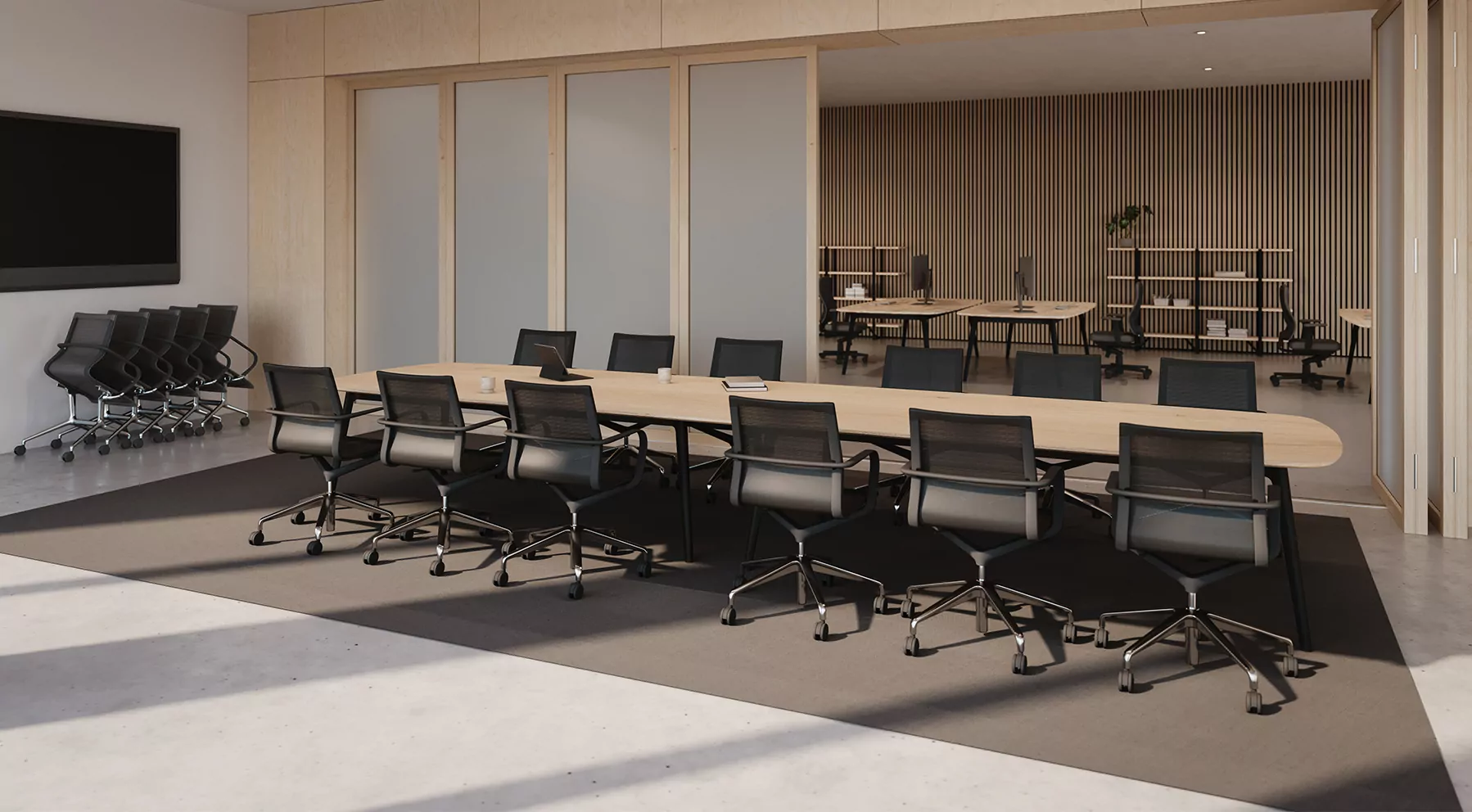 Modern boardroom with used office furniture Mississauga businesses trust, featuring a large conference table and ergonomic seating sourced through The Office Shop