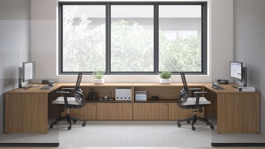 Dual workstation setup with shared storage and ergonomic chairs from The Office Shop, a trusted source for office furniture rental Toronto corporate teams depend on