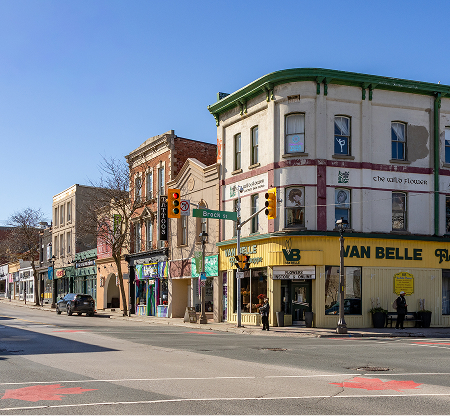 Downtown Whitby Ontario intersection at Brock Street with heritage buildings and local businesses supported by The Office Shop for office furniture Whitby projects