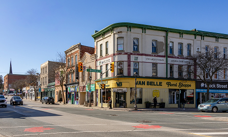 Historic downtown Whitby Ontario streetscape featuring local shops and storefronts in the area served by The Office Shop for office furniture Whitby solutions
