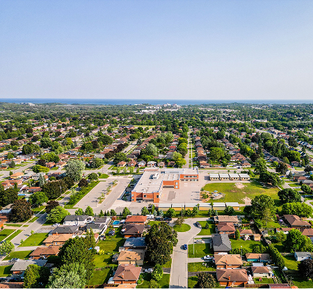 Aerial view of Oshawa Ontario residential neighbourhoods and community buildings in the area served by The Office Shop for office furniture Oshawa solutions