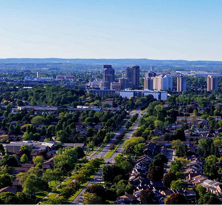 Ajax Ontario skyline featuring high-rise buildings and surrounding business areas supported by The Office Shop for office furniture Ajax projects