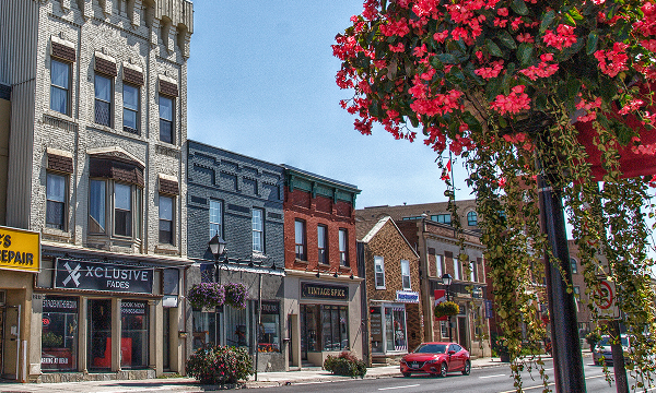 Aurora Ontario downtown corridor showing local shops and storefronts where The Office Shop provides Aurora office furniture services