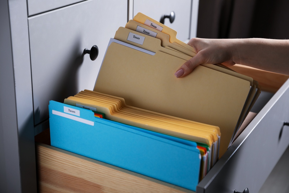 Modern office cabinets providing organized storage for documents and office supplies in a professional workspace.