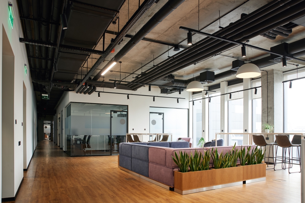 Contemporary office interior displaying desks, chairs, and storage solutions commonly offered by office furniture retailers.
