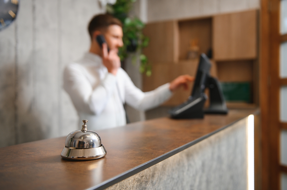 Professional office interior displaying a functional office reception desk with a clean, organized reception area.
