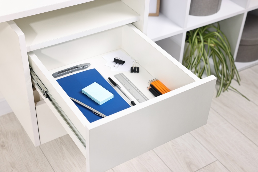 Modern office interior with custom office storage solutions designed to maximize organization, efficiency, and available workspace.