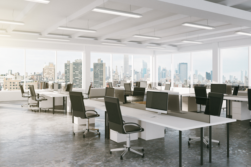 Contemporary office featuring sleek desks, ergonomic chairs, and commercial office furniture that enhances workplace efficiency and modern design.