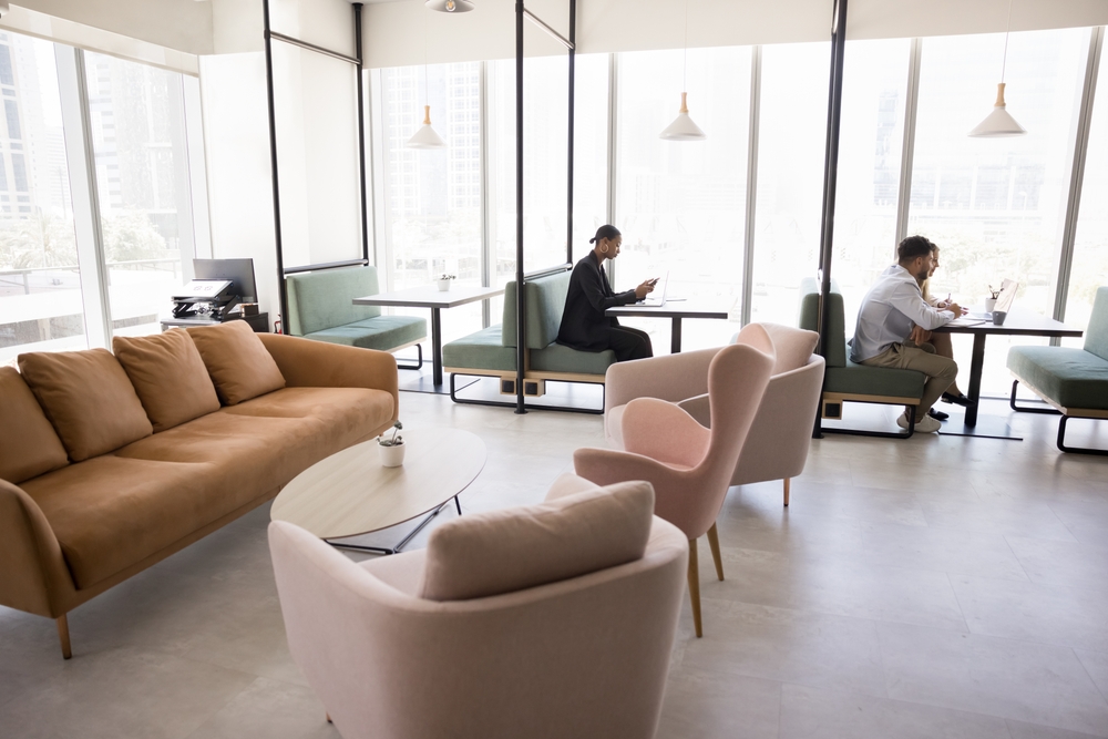 Ergonomic office lounge furniture featuring upholstered armchairs in a Toronto workplace