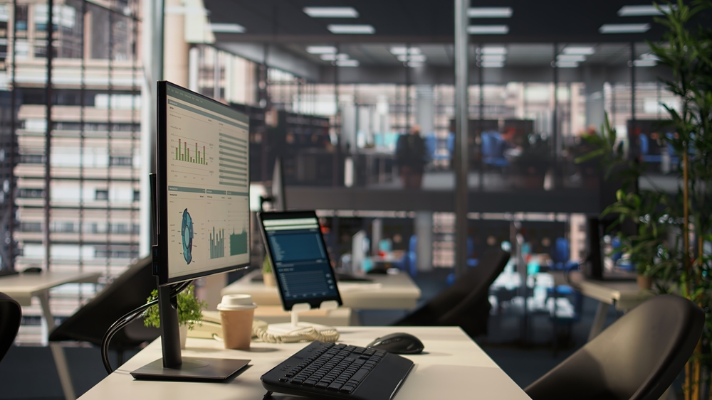 Office cubicles paired with ergonomic chairs and height-adjustable desks