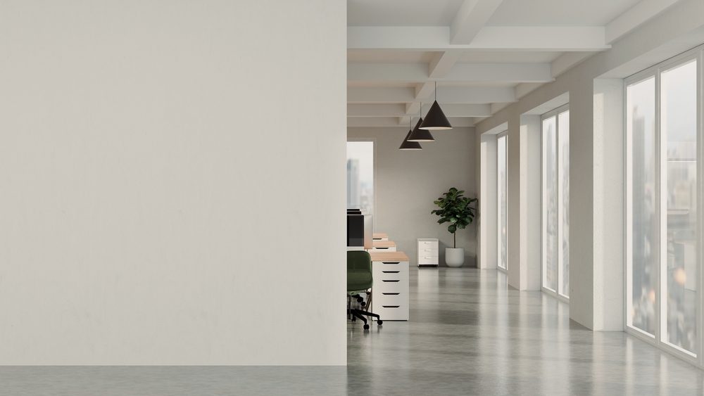 Modern boardroom with conference table and chairs set up using an office relocation checklist