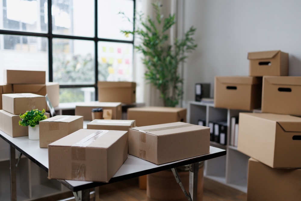 Office storage cabinets and workstations organized in a new workspace using an office relocation checklist