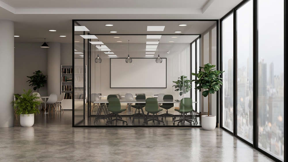 Meeting room with a conference table and chairs selected as coworking space furniture for member bookings
